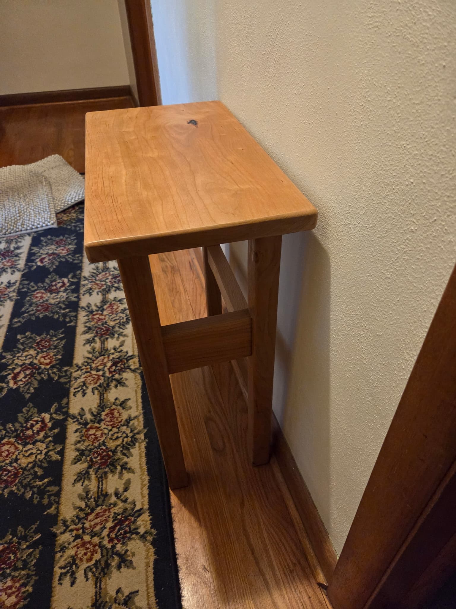 Handcrafted wooden side table with natural finish