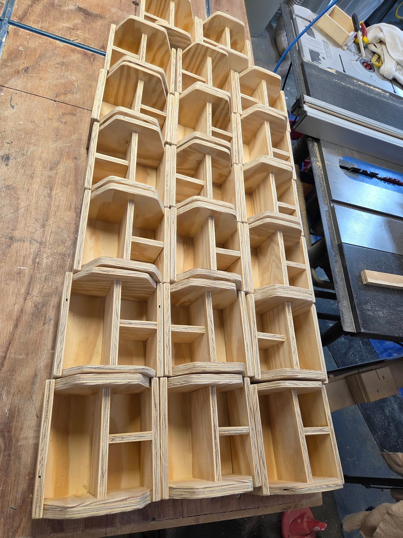 Batch of handmade wooden organizers on the workbench